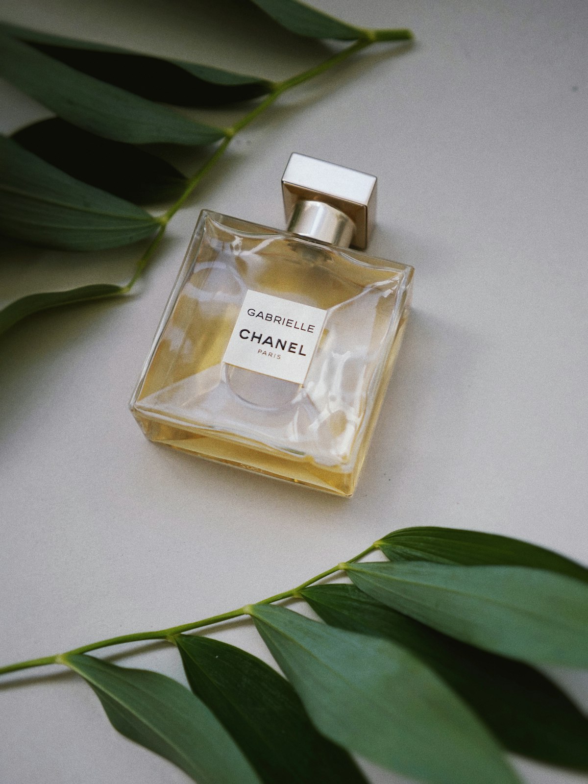 Men's fragrance — classic perfume bottle with dramatic lighting